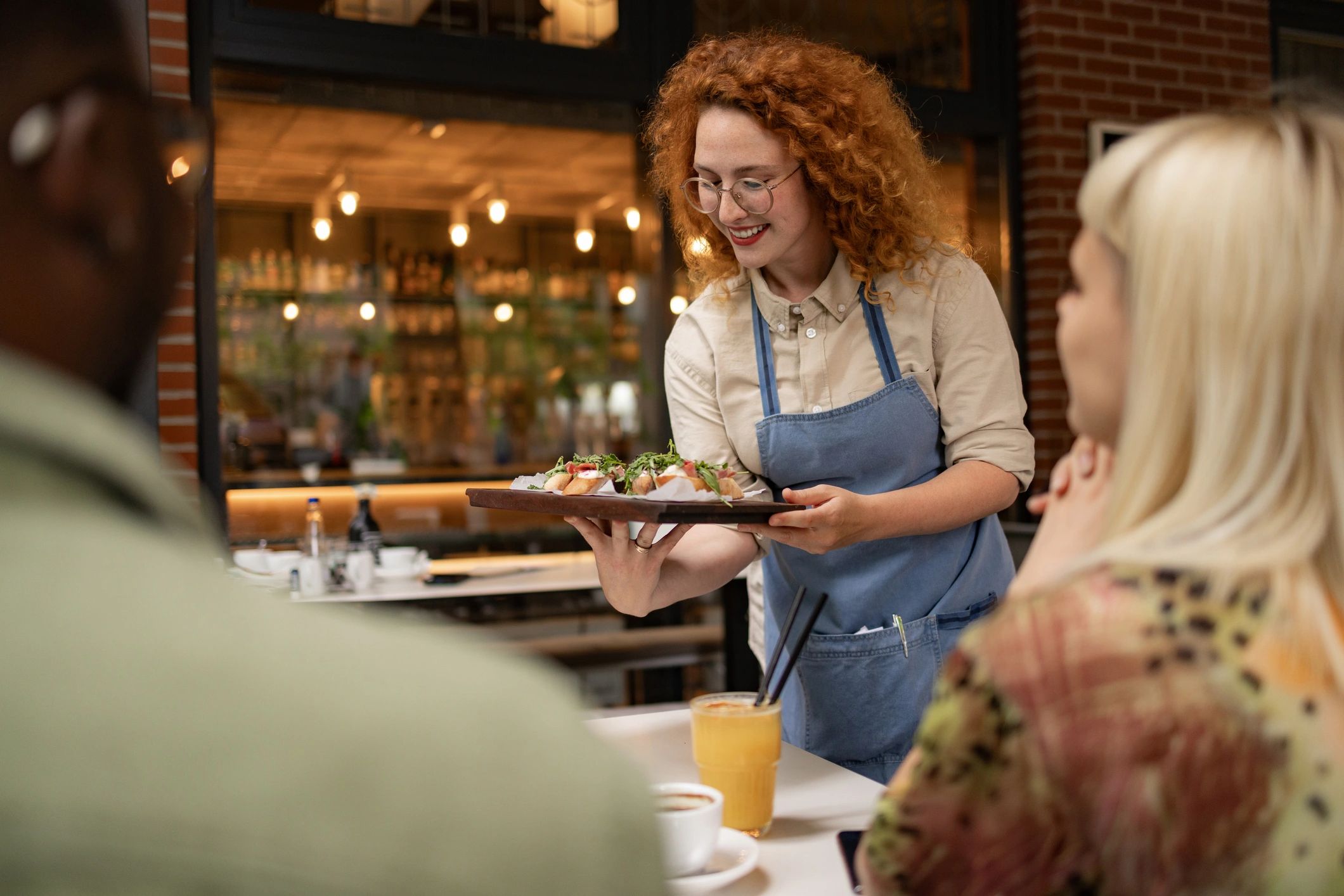 Friendly restaurant service in a welcoming dining setting