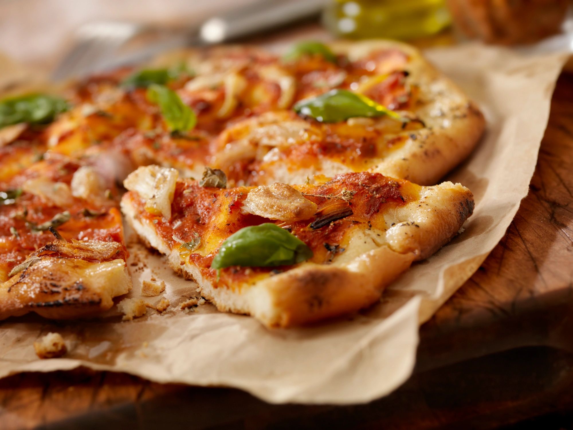 Homemade marinara pizza with basil and garlic